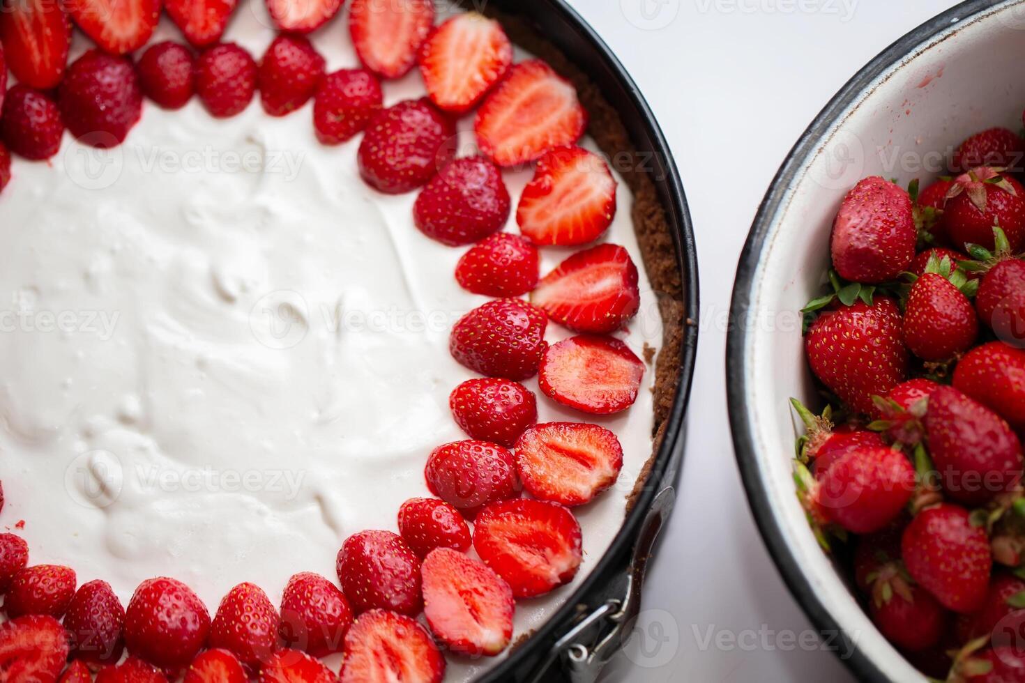 Cheesecake with curd cream decorated with fresh strawberries. photo
