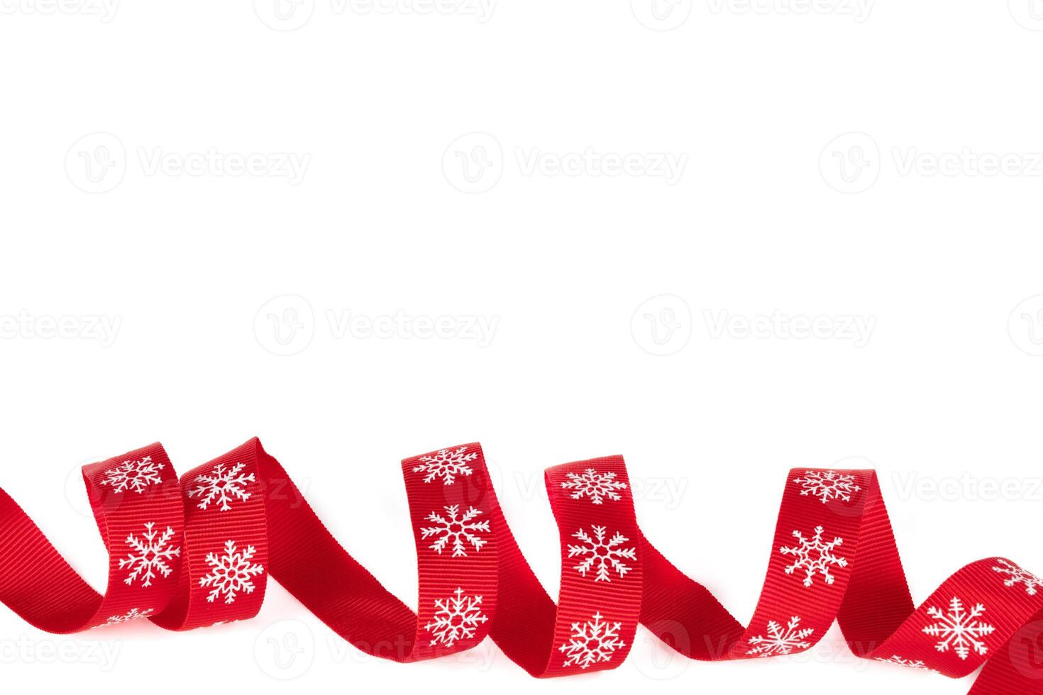 Christmas red ribbon twisted isolated on white background. photo