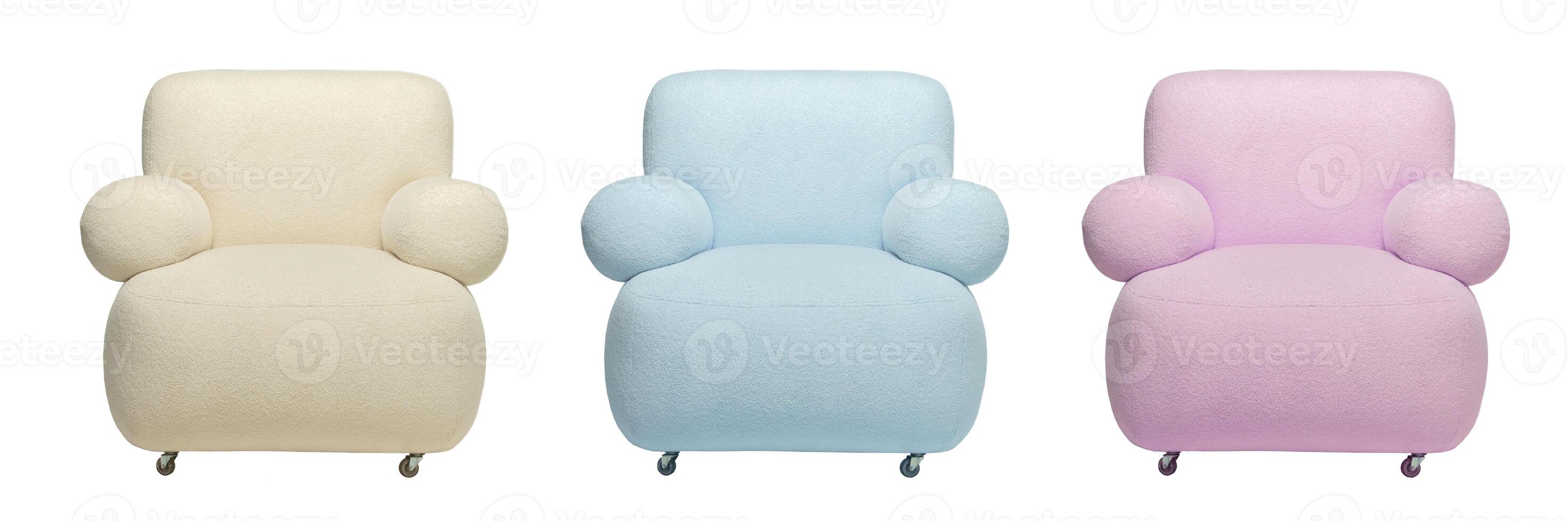 Three soft armchairs in different colors of pastel shades of pink and blue on a white background. photo