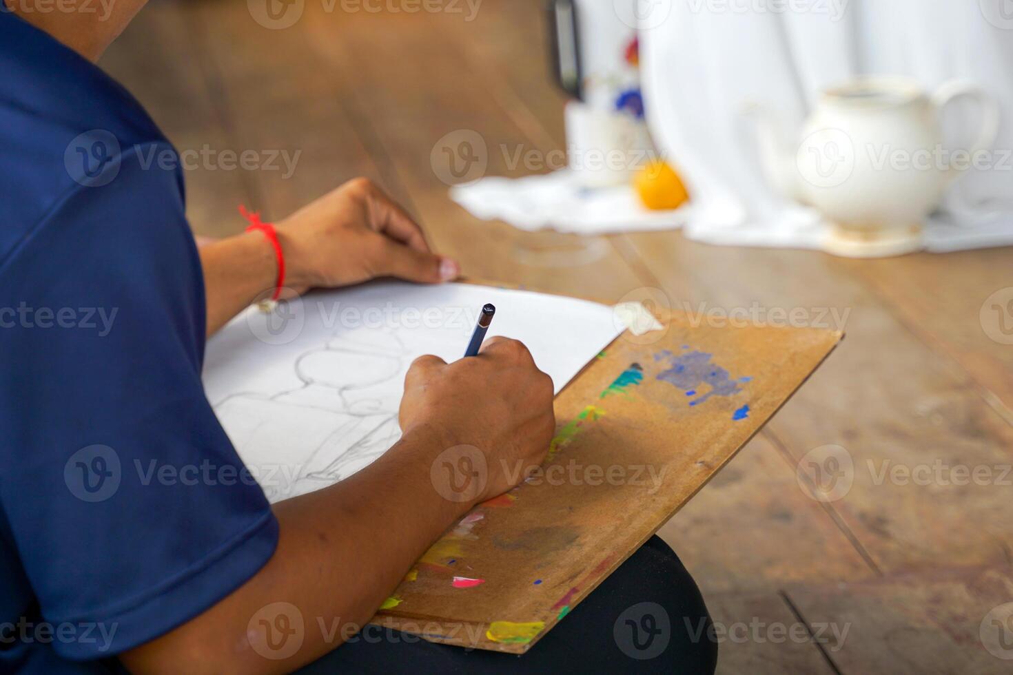 Students draw pictures of objects with various shapes. Placed as a model on the table for students to practice drawing light and shadow. soft and selective focus. photo