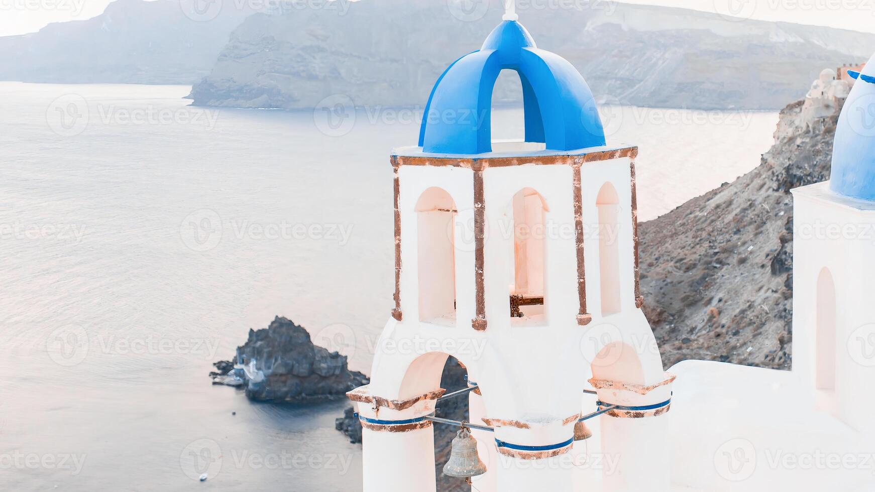Santorini Greece Europe travel vacation banner. Oia city, Famous european tourist destination Three Domes church panoramic view. Horizontal landscape banner crop for advertisement copy space. photo