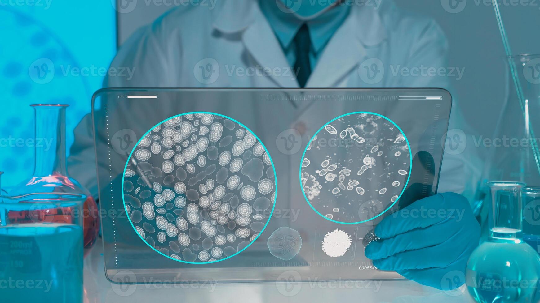 Young male chemist working in the lab Laboratory environment. the assistant manipulates the Petri dish. Lab coat. Glass equipment. Blue laboratory. Research. photo