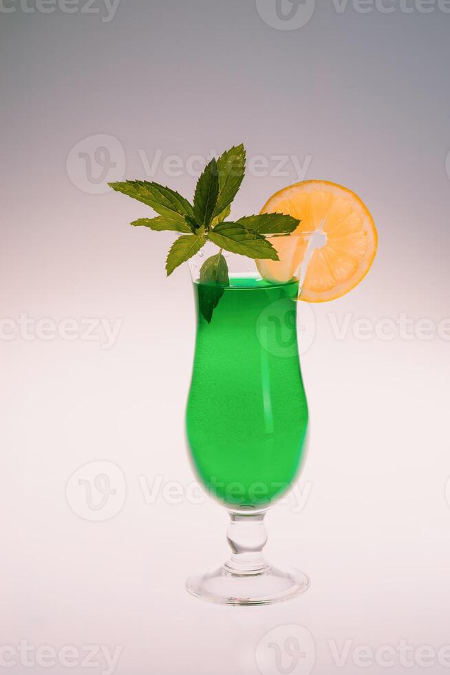 Drinks, Green, Cocktail with mint and orange slice White Background. photo