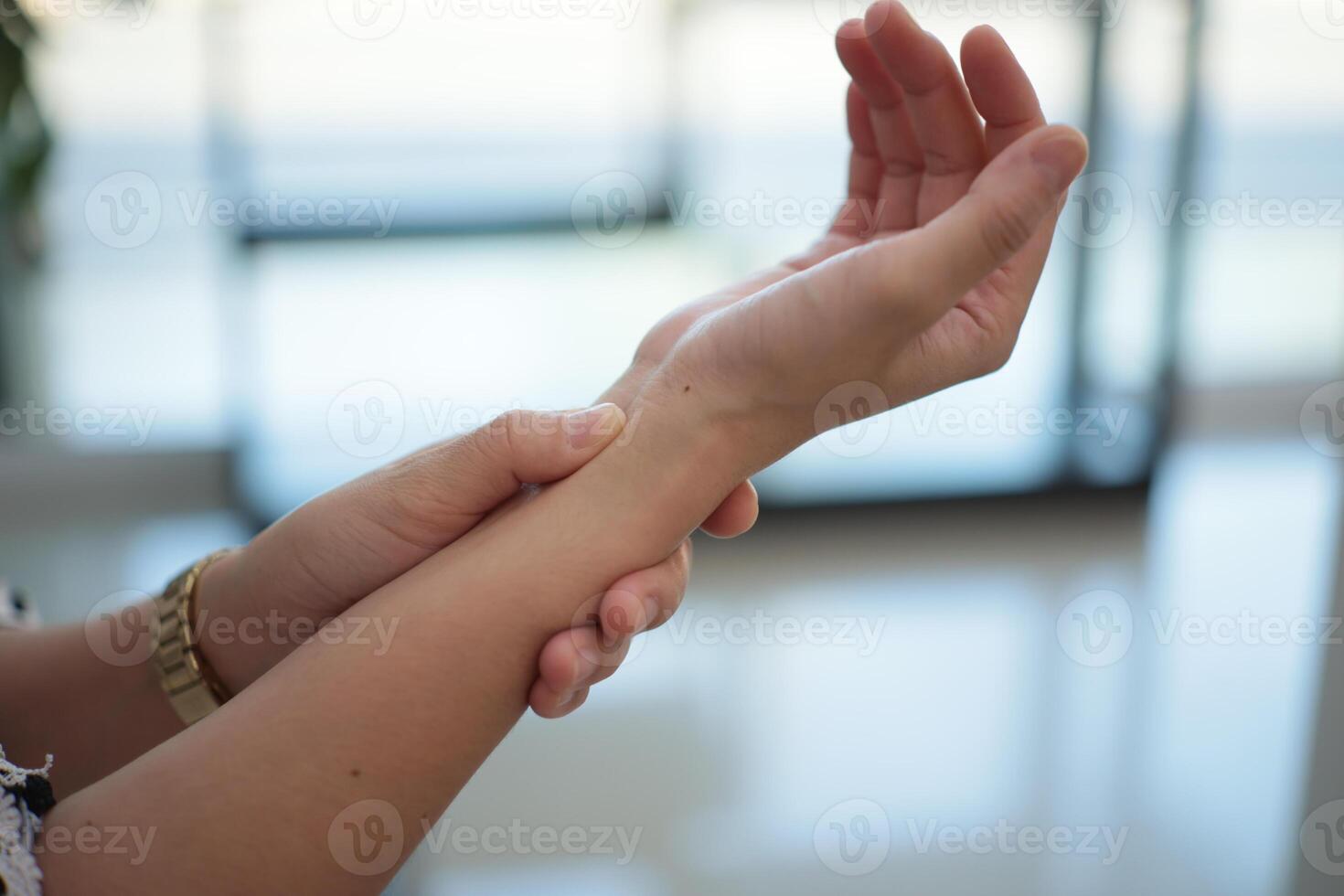 Wrist massage relieves pain. photo