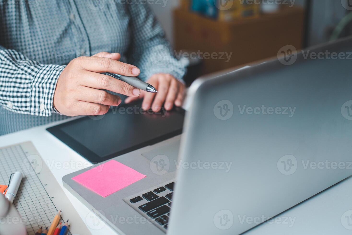 The graphic designer creative team is currently working on the design and color selection on the guide color for advertising design. photo