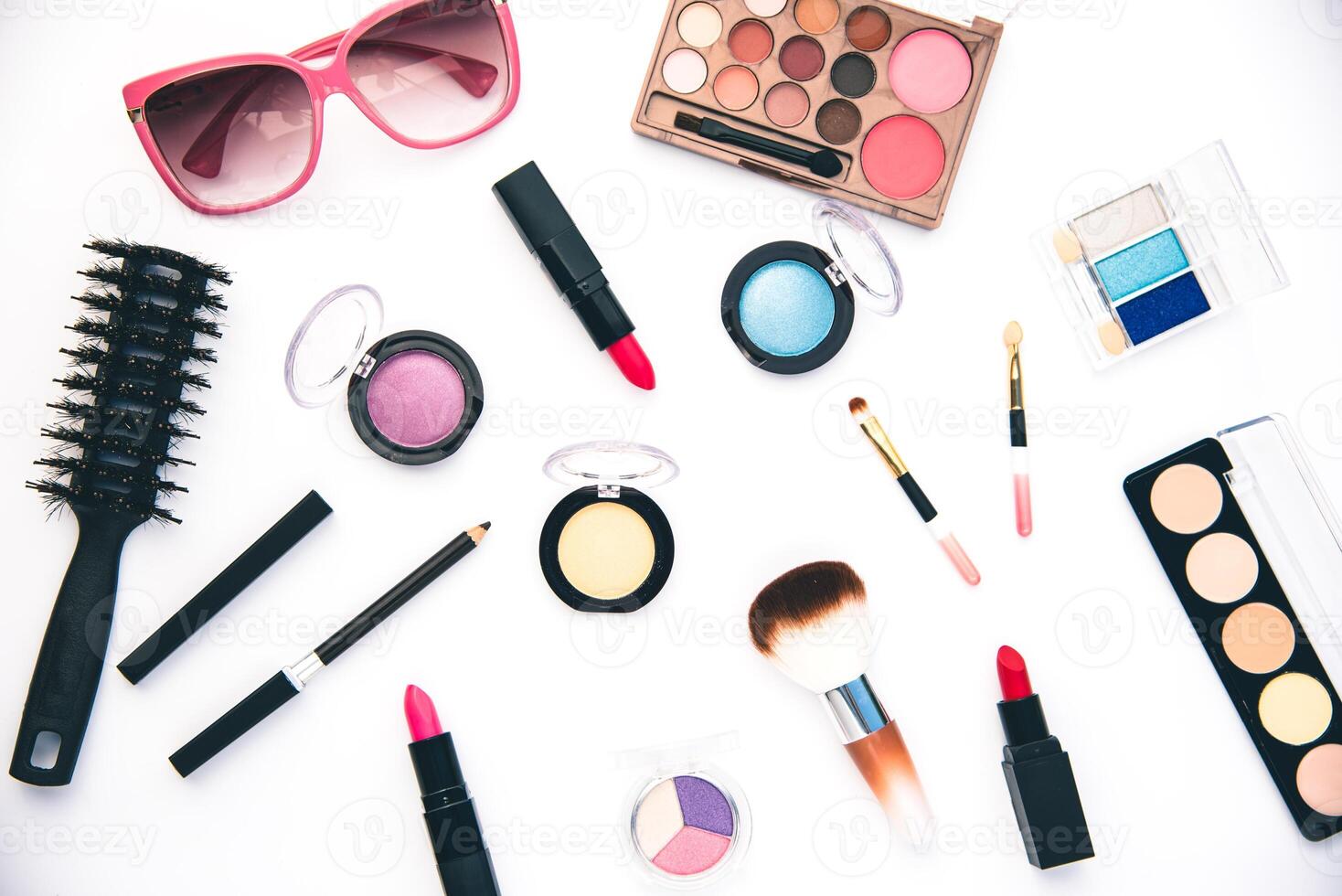 Set of decorative cosmetics for women on white background photo