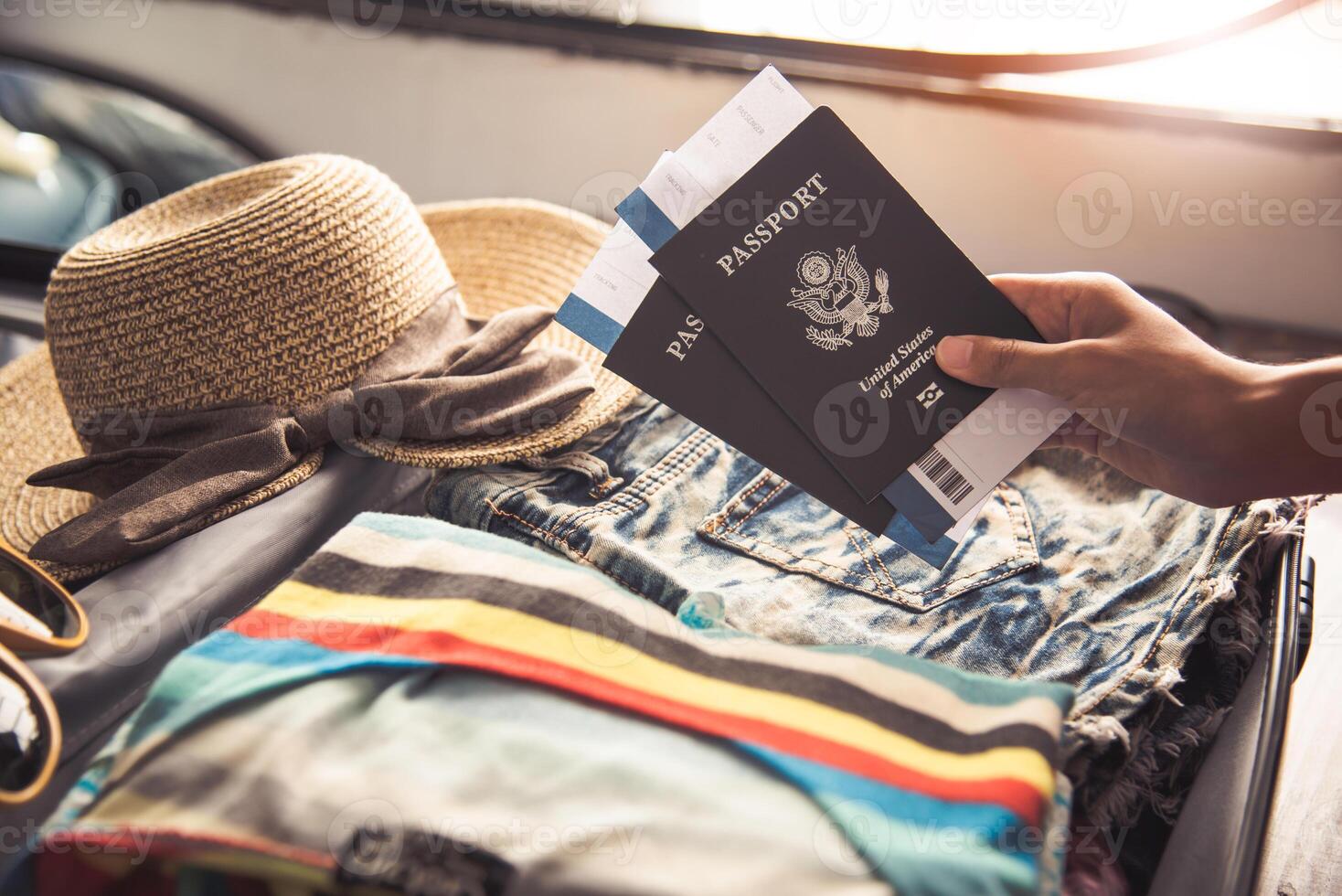 People holding passports, map for travel with luggage for the trip photo