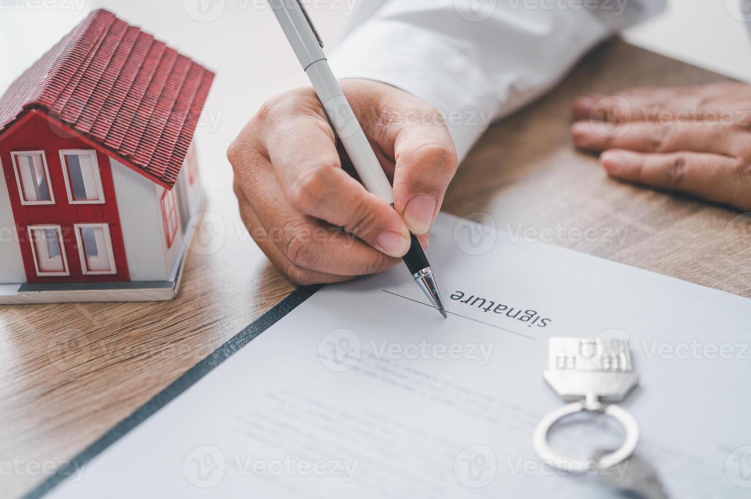 businessman is negotiating, counseling, and clarifying the details of a contract so that it can be signed. photo