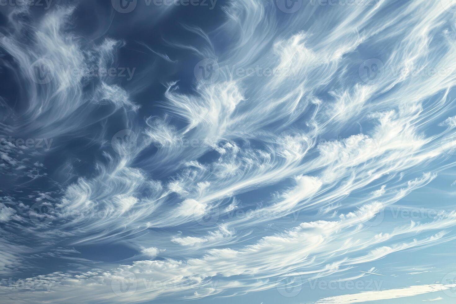 Photo of some white whispy clouds and blue sky cloudscape