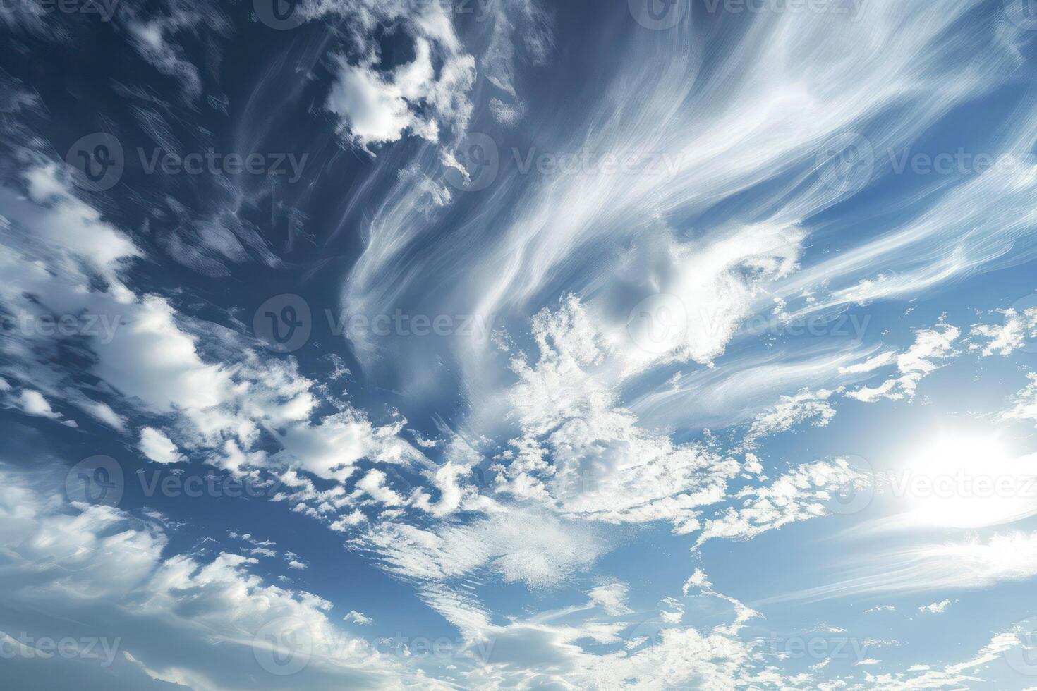 Photo of some white whispy clouds and blue sky cloudscape