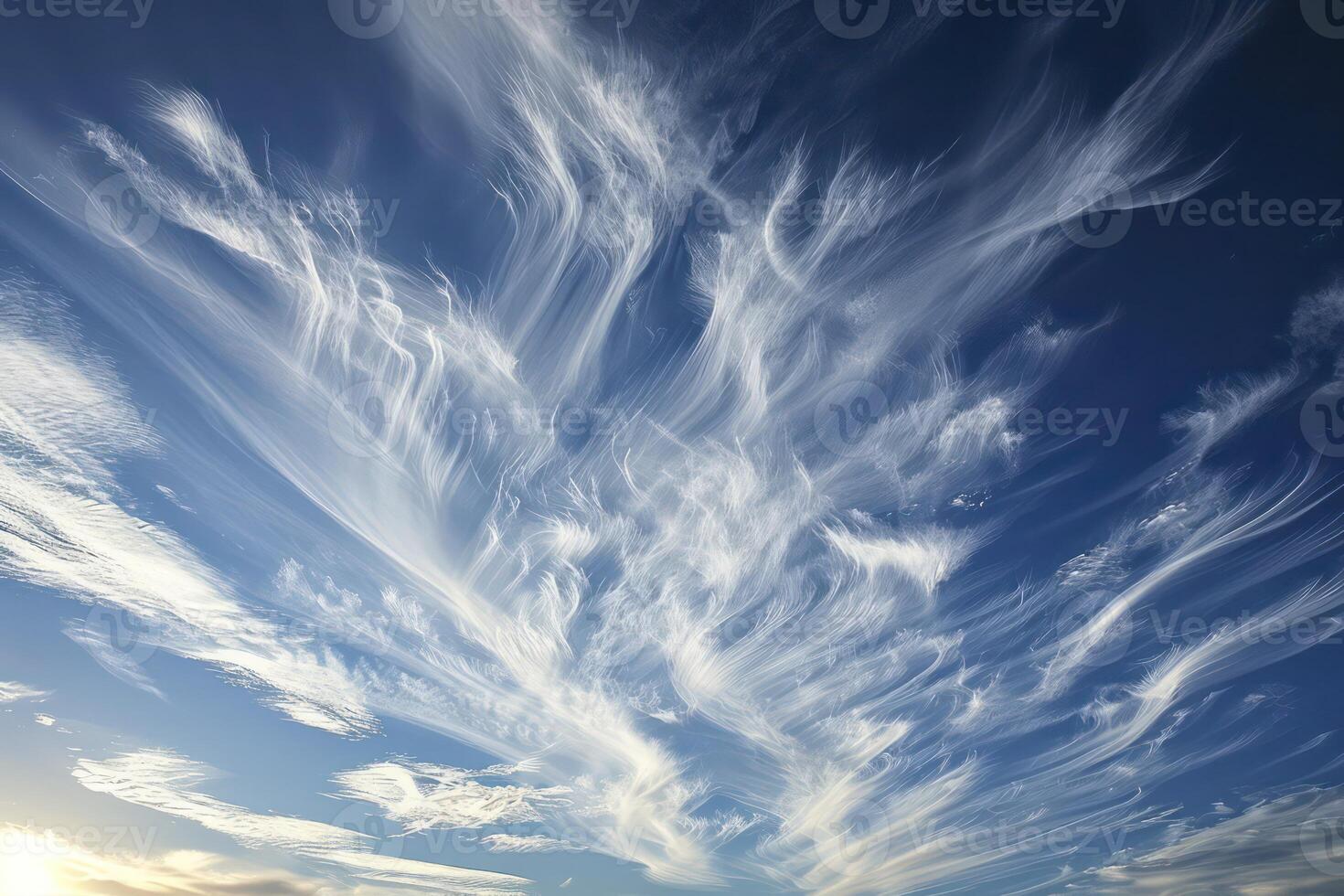 Photo of some white whispy clouds and blue sky cloudscape