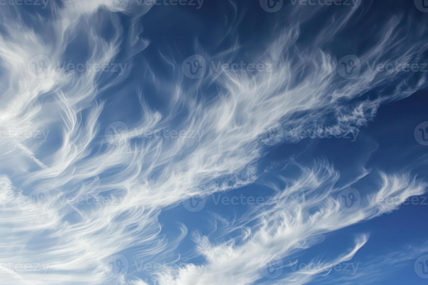 Photo of some white whispy clouds and blue sky cloudscape