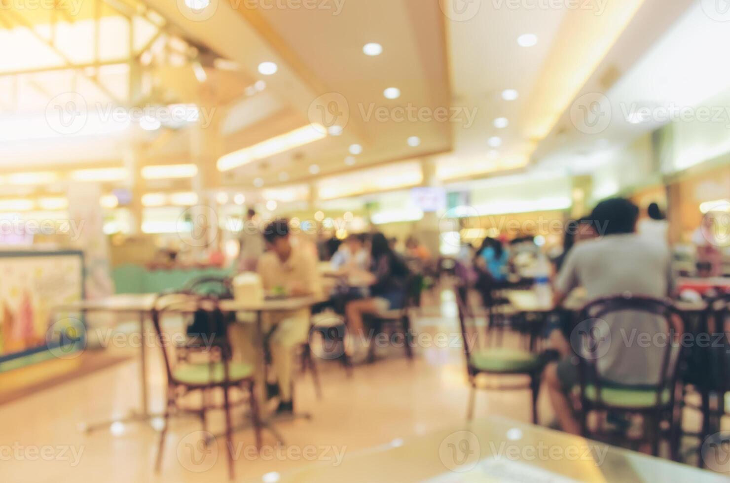 blurred people in food center and coffee shop ,break lunch time photo