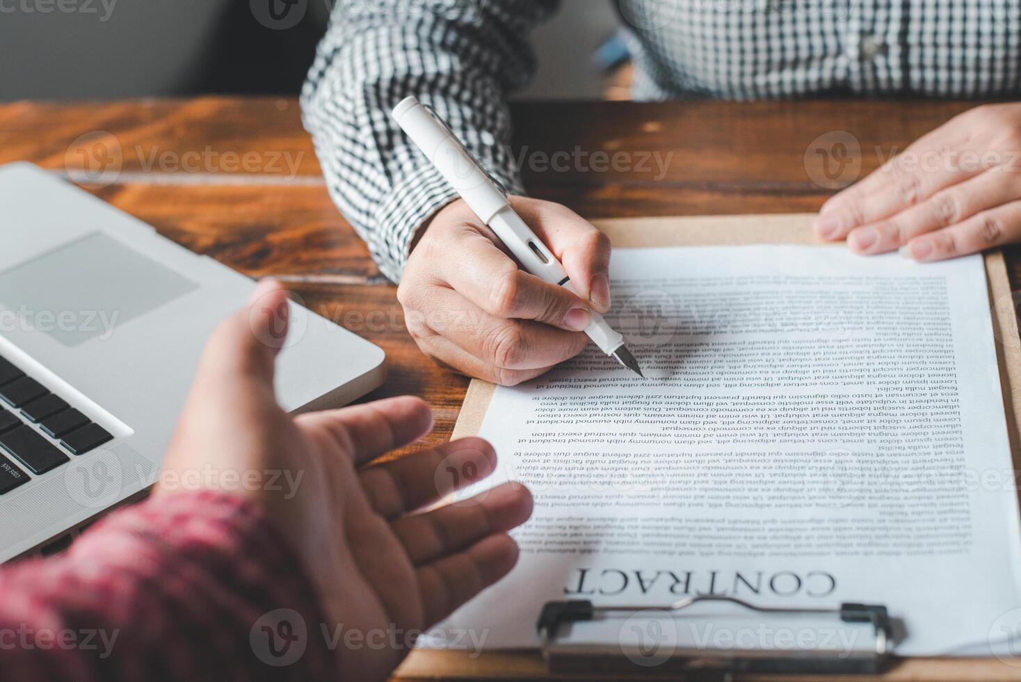 Businessmen are contracting in the purchase-sale contract. photo