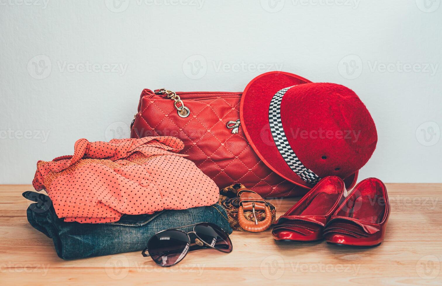 clothing for women, placed on a wooden floor. photo