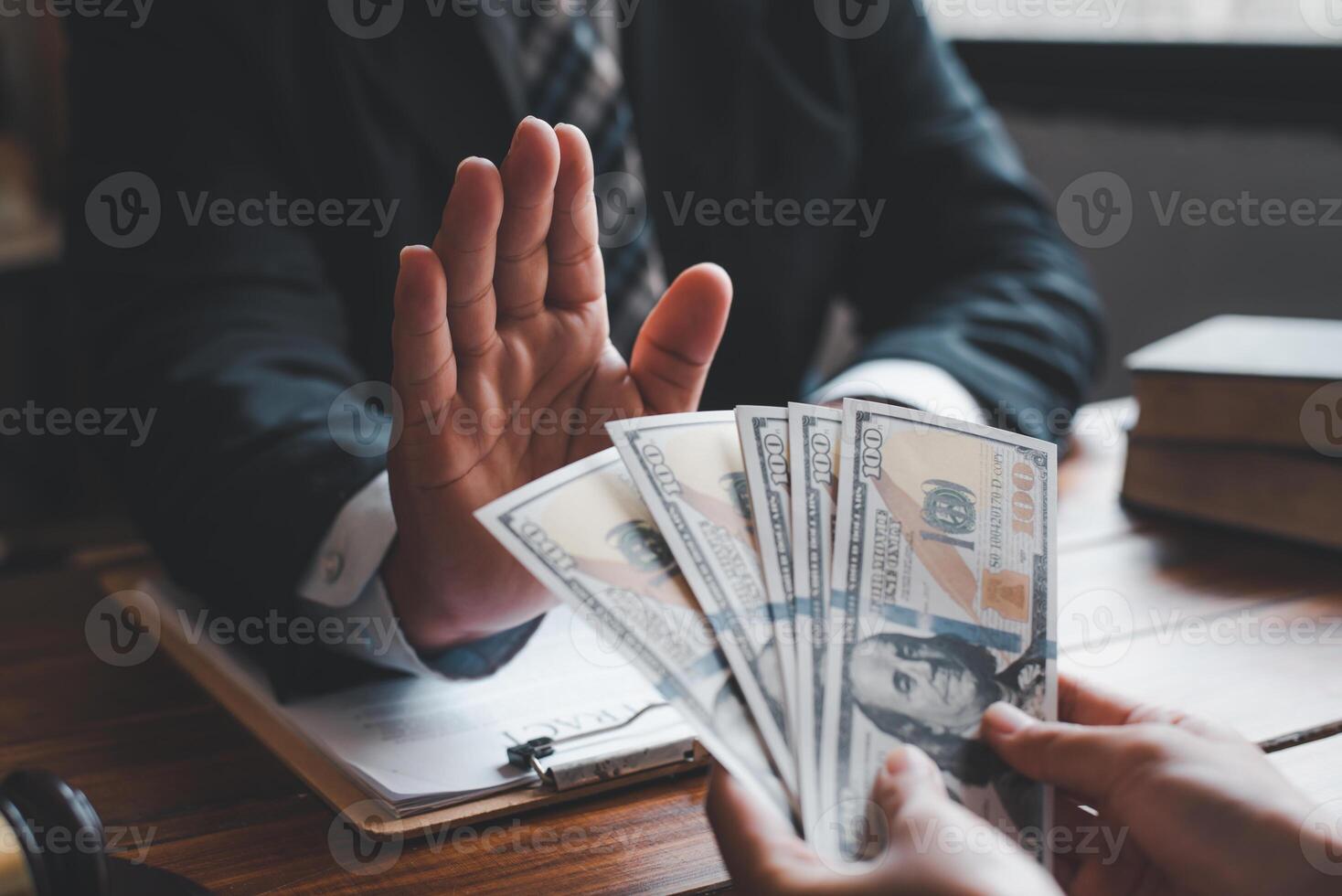 Businessmen refuse to accept bribes in signing contracts. The concept of anti-corruption. photo