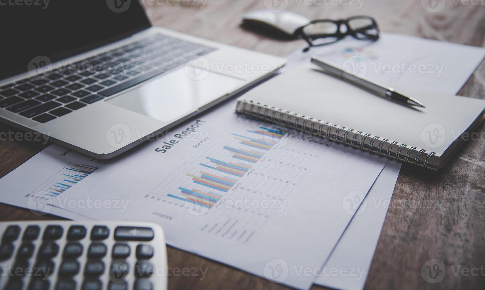 Data Analysis Chart And Graphs placed on the desk in the office. Business Analysis and Planning Concept photo