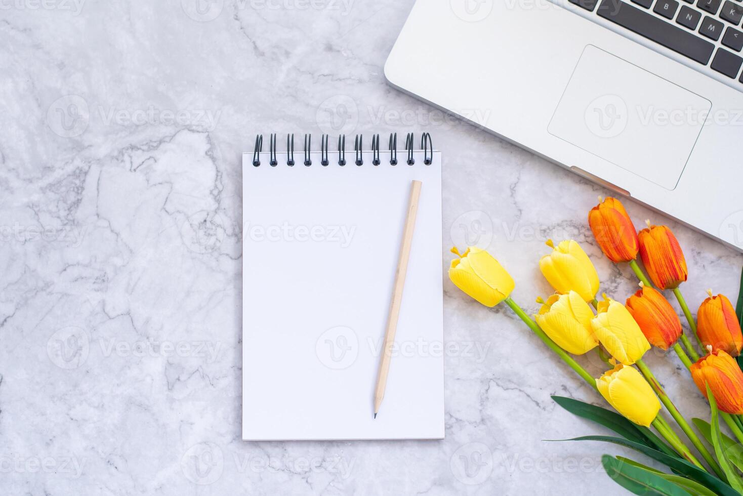 flat lay photo of workspace.  Top view mock up notebooks, flowwer, copy space