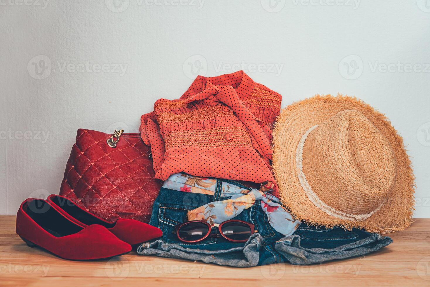 clothing for women, placed on a wooden floor. photo