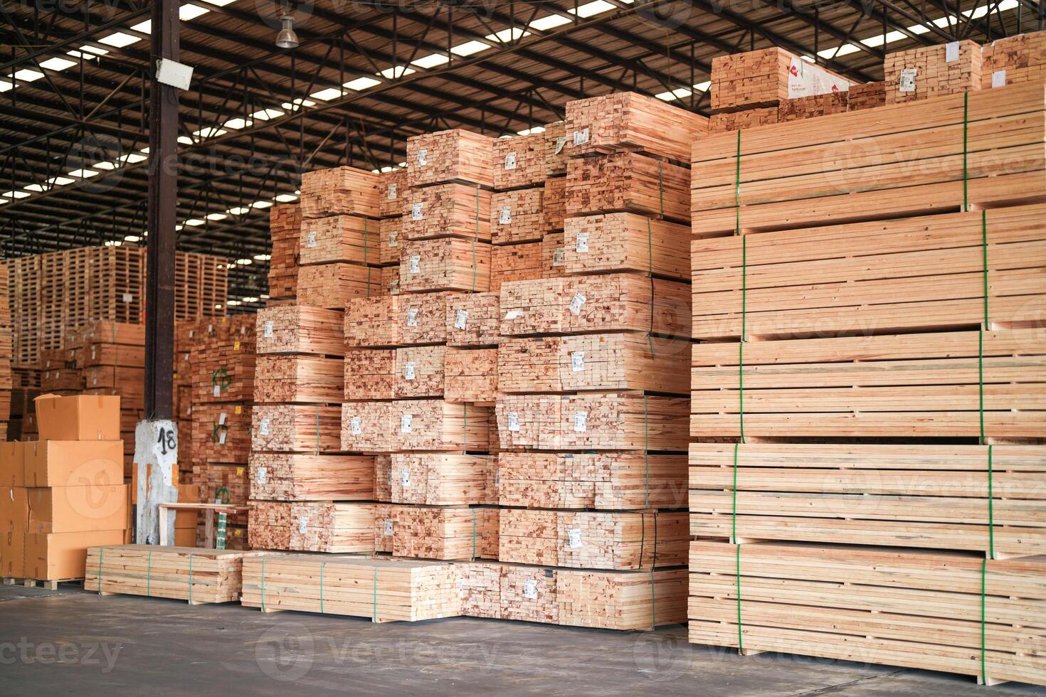 background of pattern wood section. Grid of wood squares. the raw of material timber on stack. photo