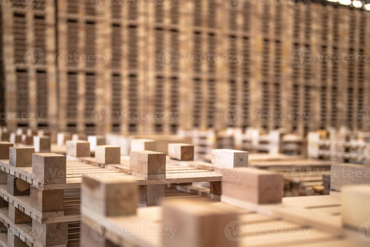 background of pattern wood section. Grid of wood squares. the raw of material timber on stack. photo