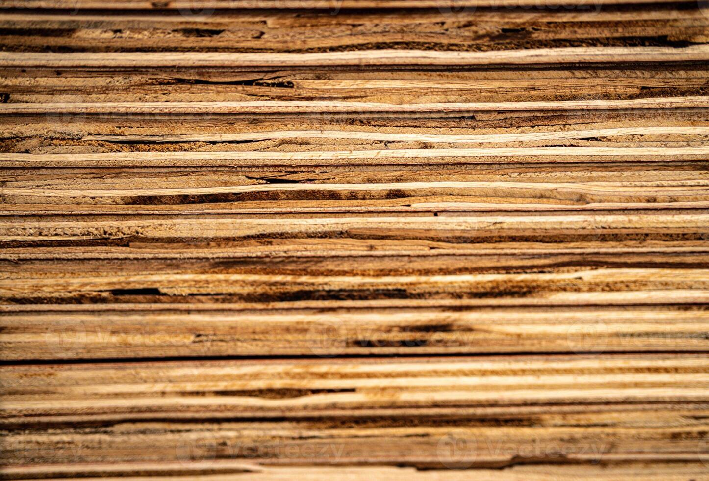 background of pattern wood section. Grid of wood squares. the raw of material timber on stack. photo