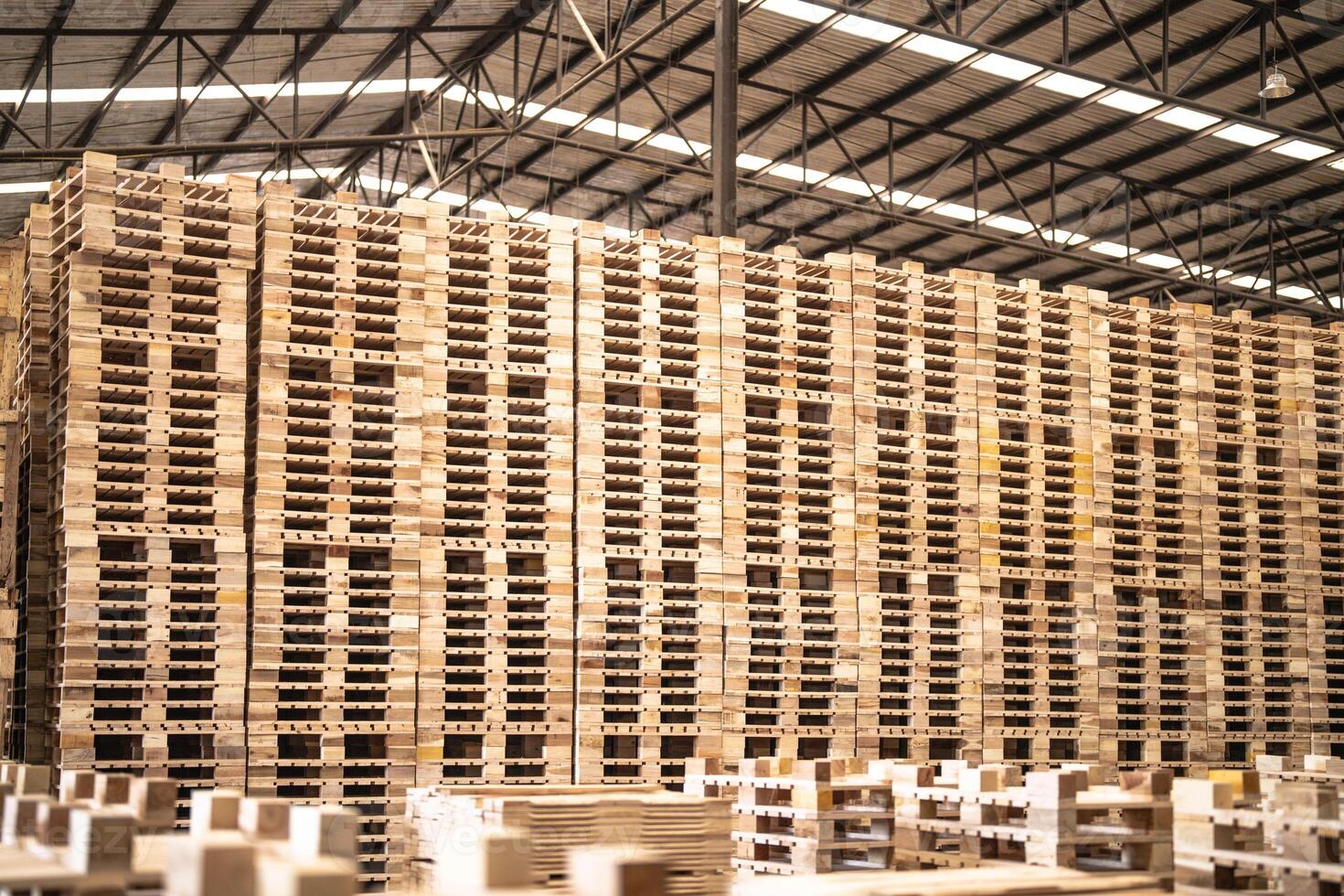 background of pattern wood section. Grid of wood squares. the raw of material timber on stack. photo