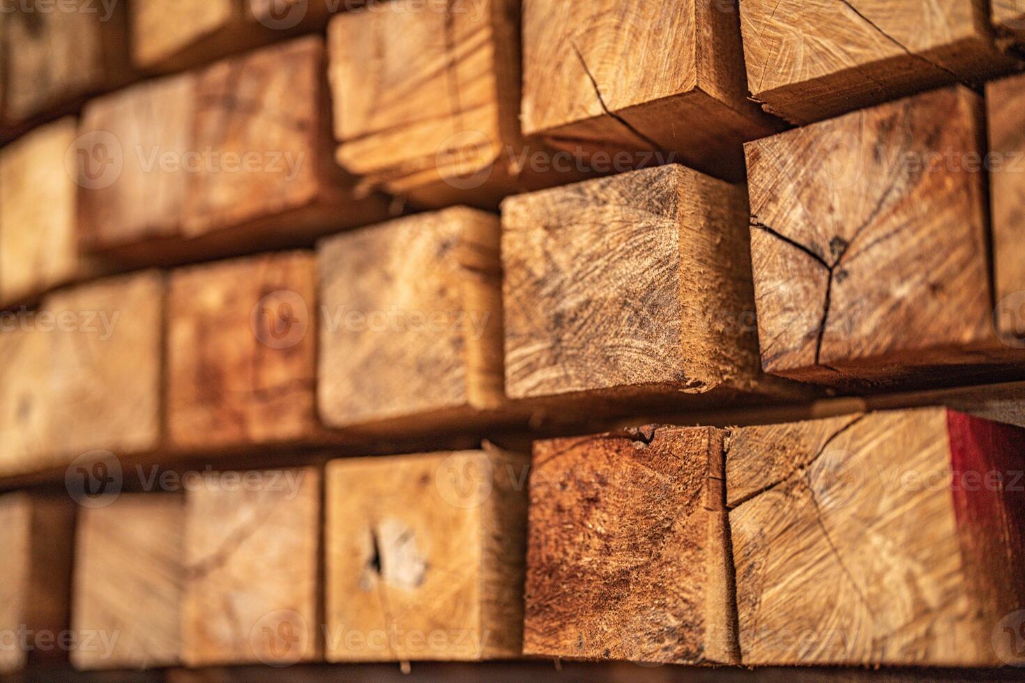 background of pattern wood section. Grid of wood squares. the raw of material timber on stack. photo