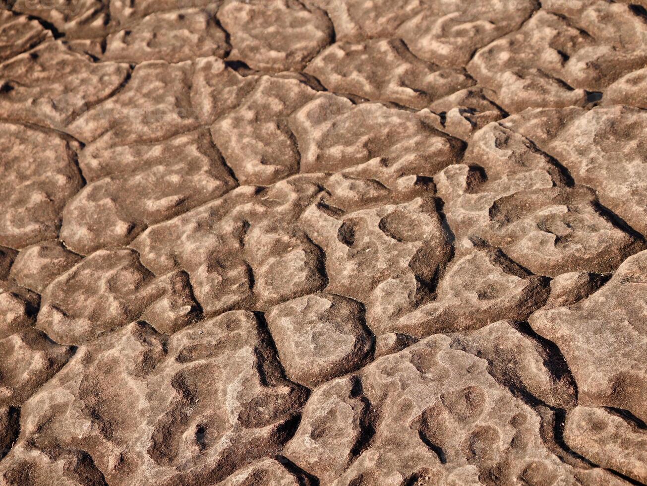 Texture of the natural sandstone cliff in the jungle, landscape of rock or sandstones, gravel sandstone patio floor, Texture of granite rock in Thailand photo