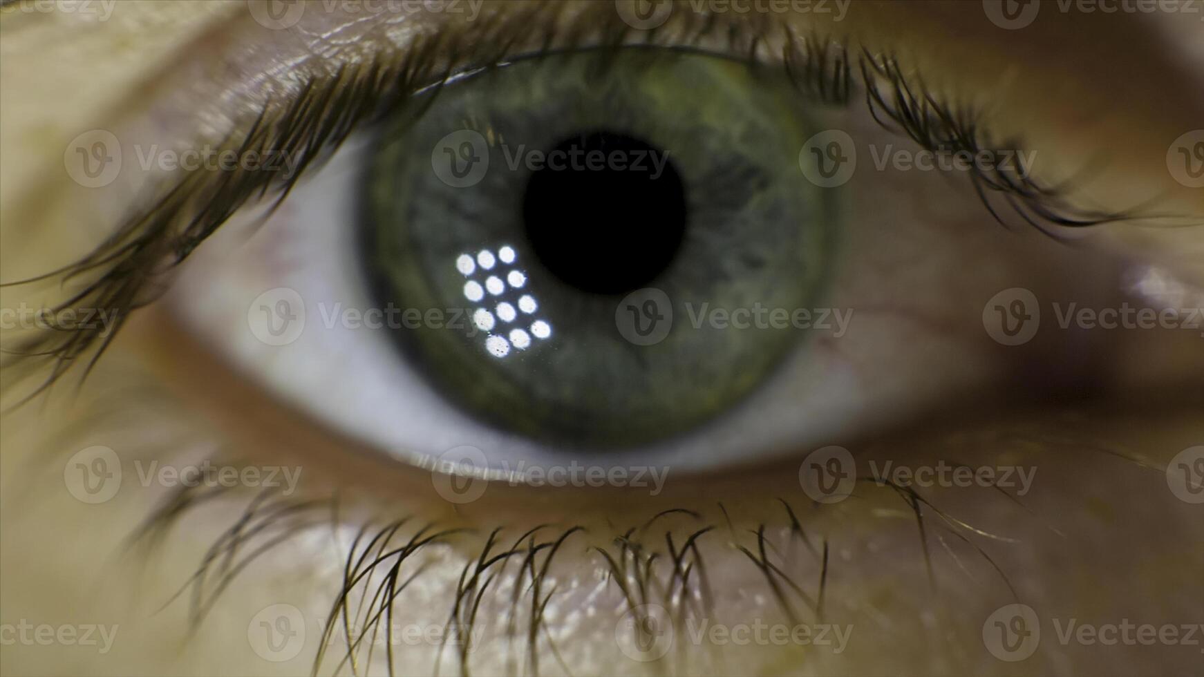 Extreme Macro of a brown eye. Video. Closeup of man's eye. spot in the eye. macro. High dynamic range and macro shot hazel eye photo