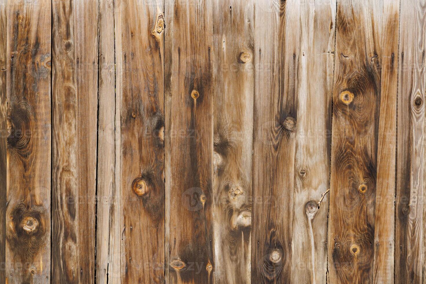 old dry weathered brownish gray wooden planks board surface - full frame background and texture photo