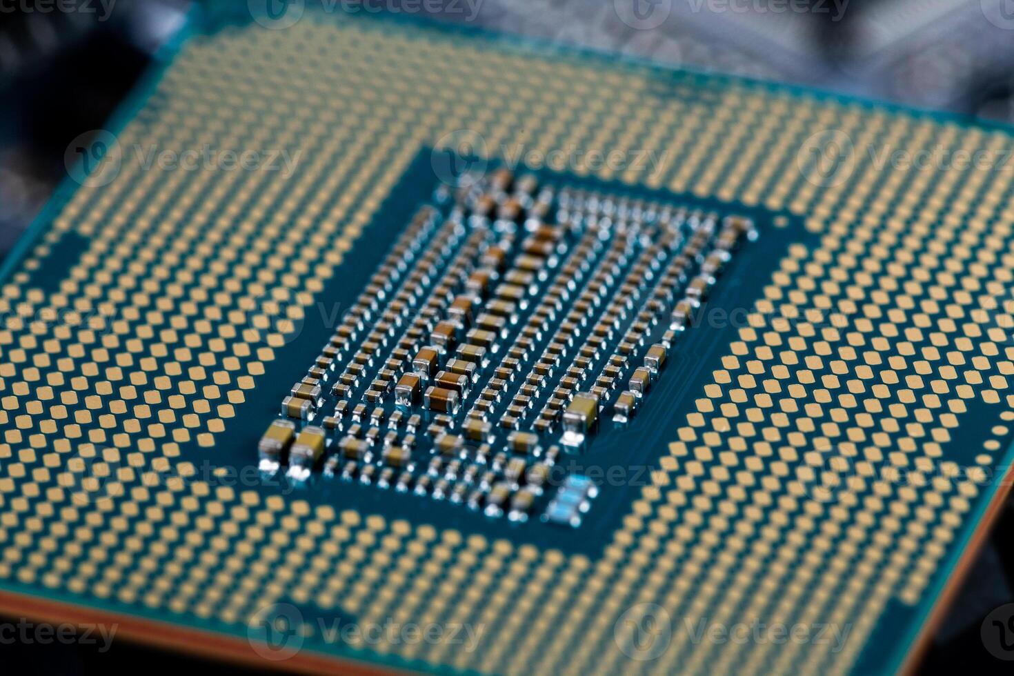 back side of modern lga 1151v2 central processor unit - closeup photo