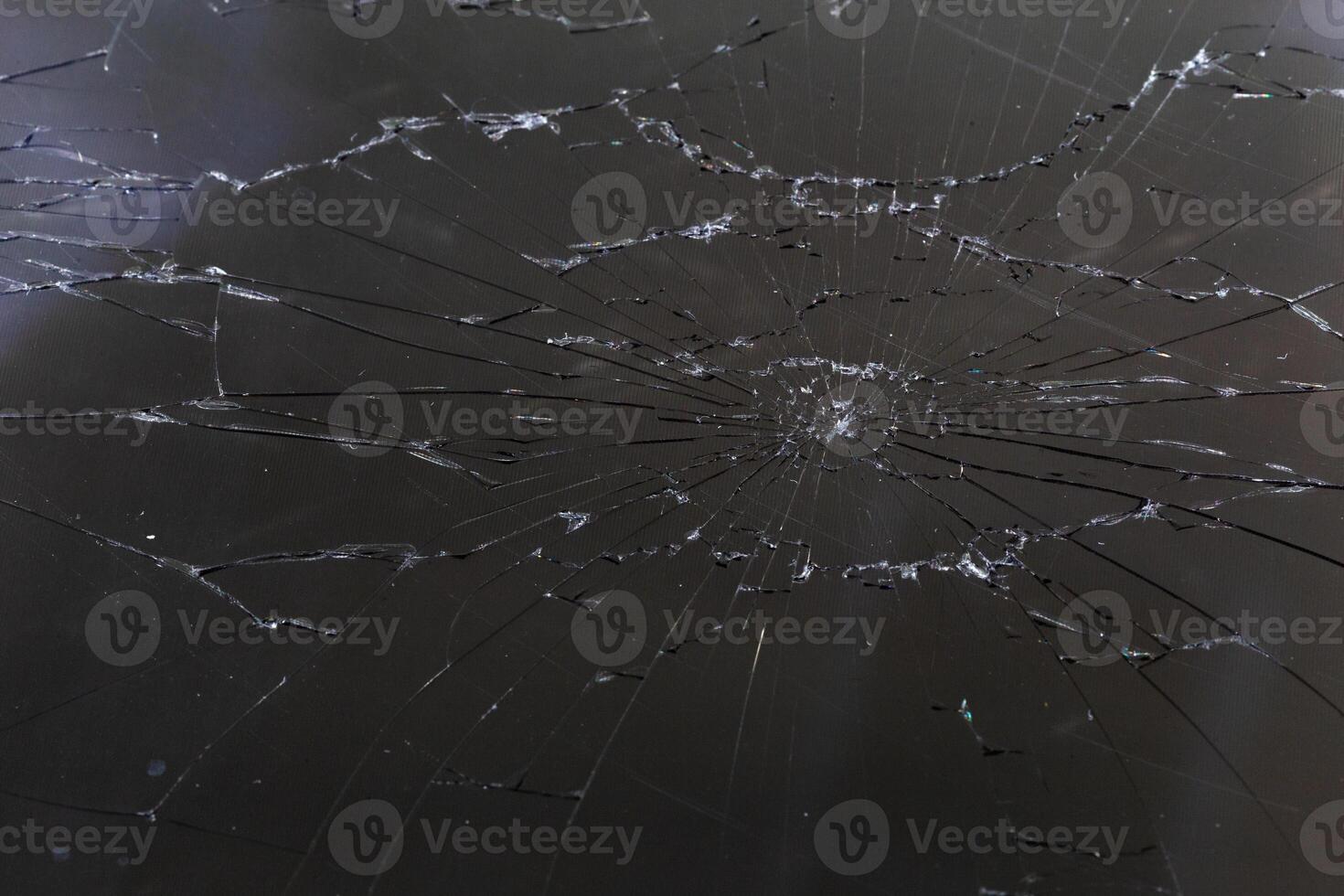 damaged LCD screen with cracks, full-frame background photo