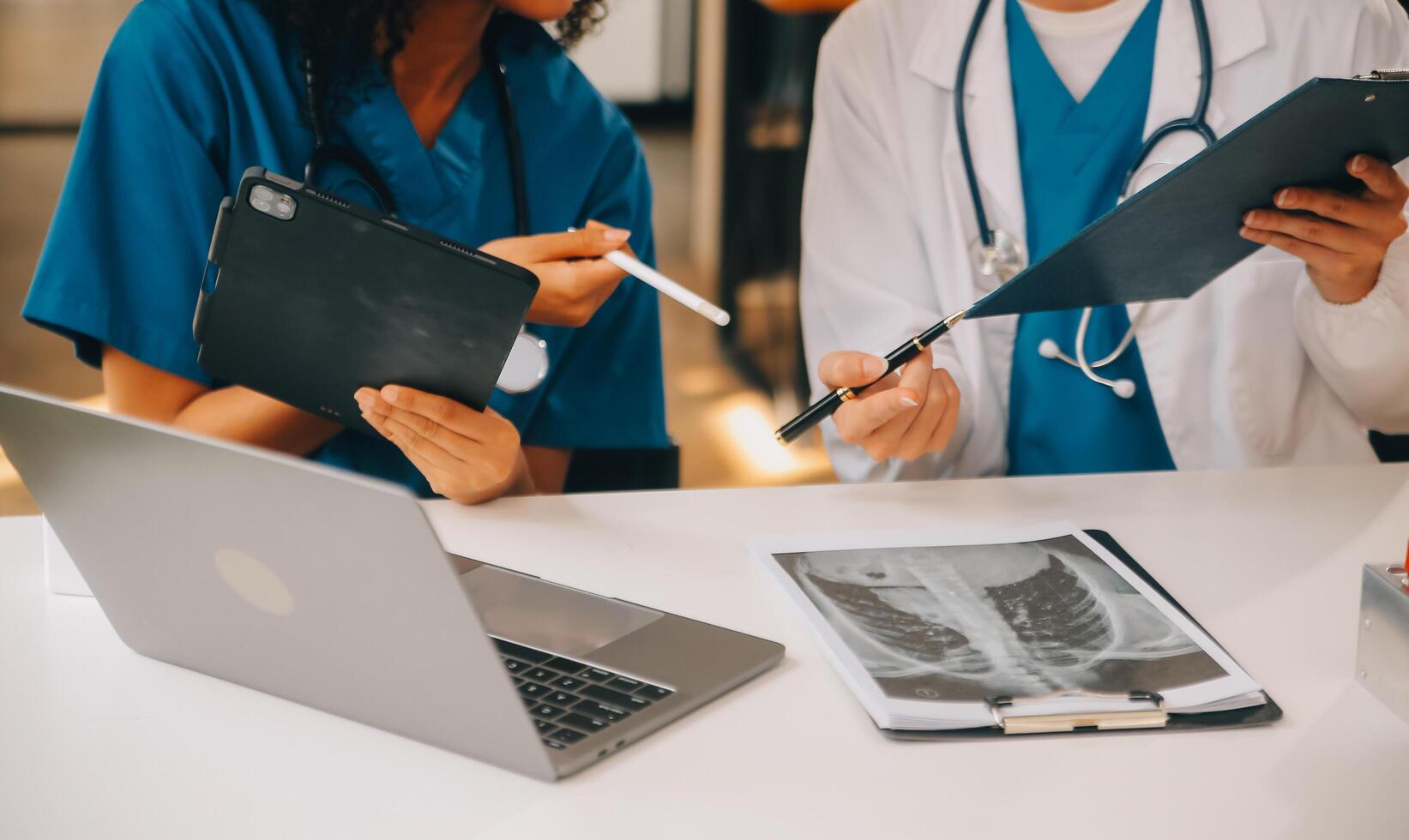 biochemical research scientist team working with microscope for coronavirus vaccine development in pharmaceutical research labolatory, selective focus photo