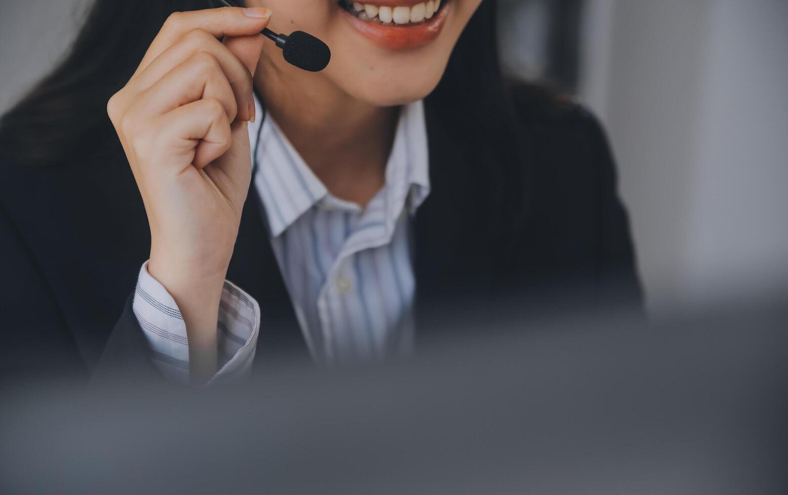Communication support, call center and customer service help desk. VOIP headset on telephone keyboard. photo