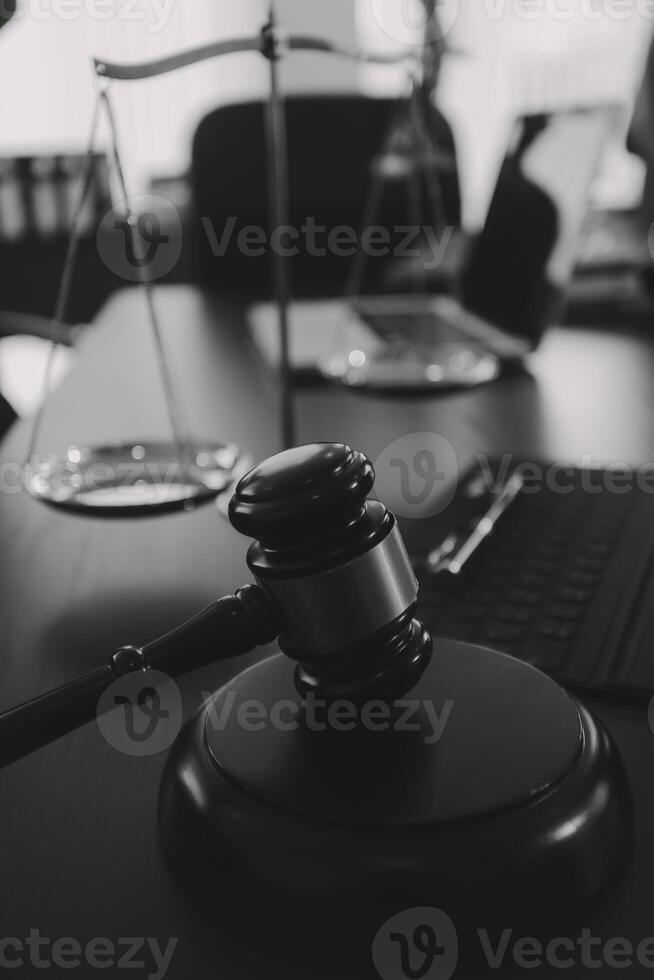 Group of experienced attorneys and lawyers giving consultation to client, helping with difficult lawsuit, explaining legal procedures and discussing agreement terms. Law services and support concept photo