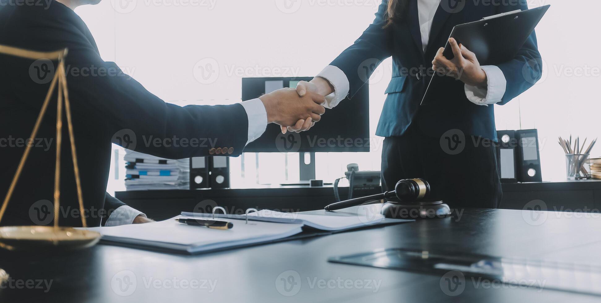 Group of experienced attorneys and lawyers giving consultation to client, helping with difficult lawsuit, explaining legal procedures and discussing agreement terms. Law services and support concept photo