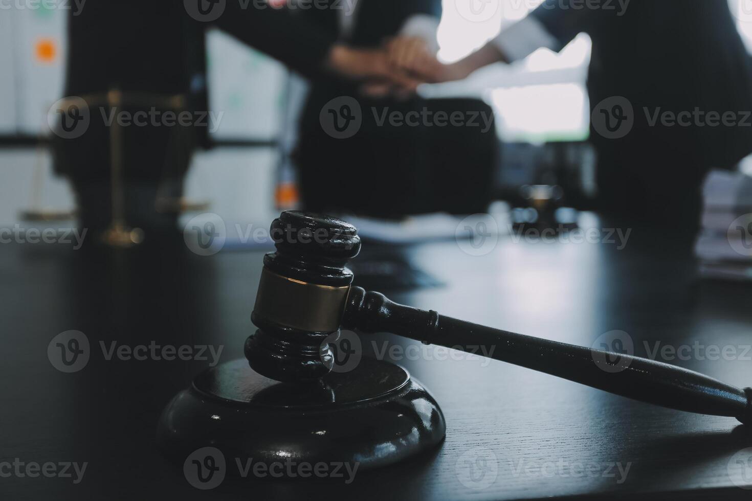 Group of experienced attorneys and lawyers giving consultation to client, helping with difficult lawsuit, explaining legal procedures and discussing agreement terms. Law services and support concept photo