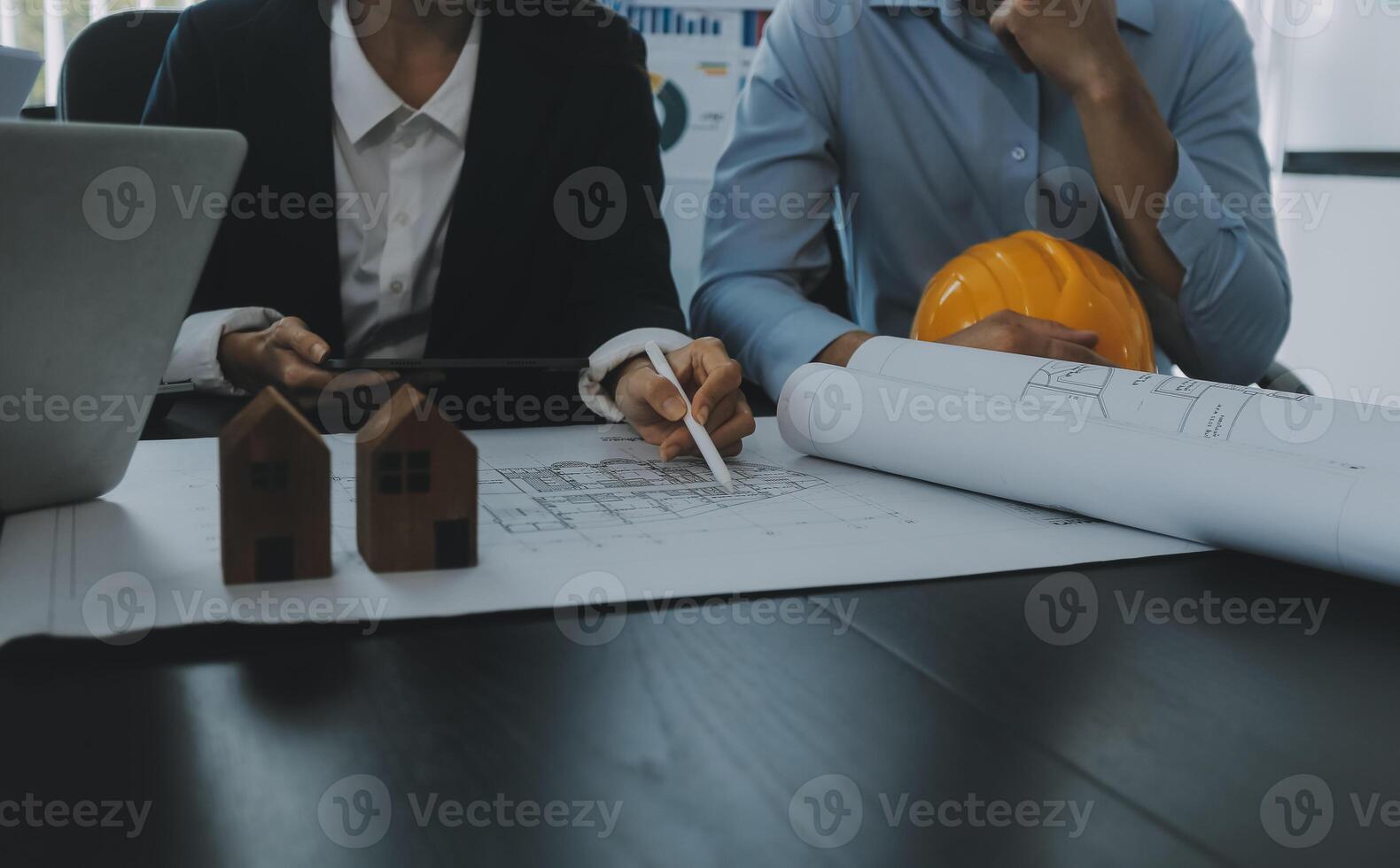 Engineer Teamwork Meeting, Drawing working on blueprint meeting for project working with partner on model building and engineering tools in working site, Construction and structure concept. photo