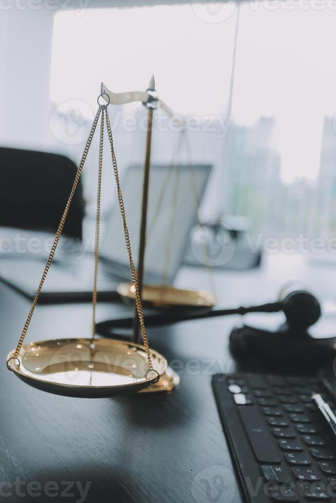 Group of experienced attorneys and lawyers giving consultation to client, helping with difficult lawsuit, explaining legal procedures and discussing agreement terms. Law services and support concept photo