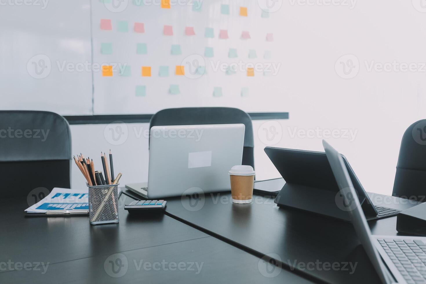 High level meeting of excutive room is decorated with stylish table and chairs around. Conference room is ready for next level of executive meeting. photo