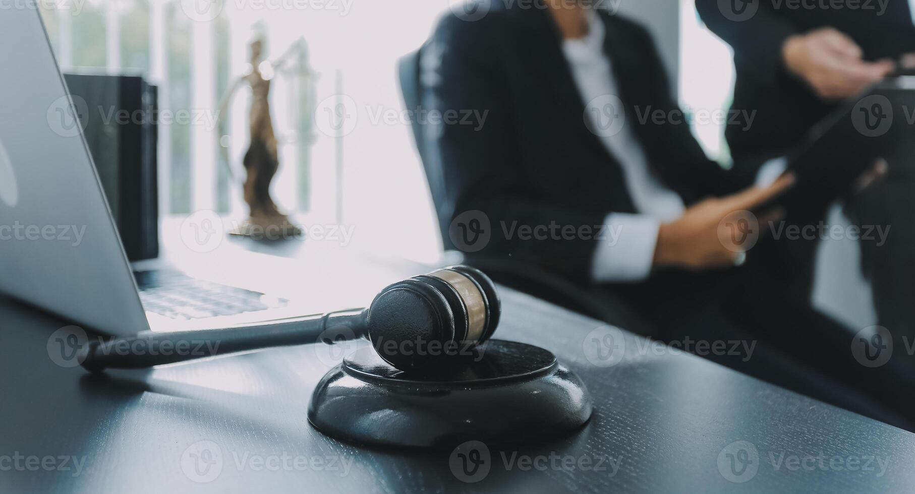 Group of experienced attorneys and lawyers giving consultation to client, helping with difficult lawsuit, explaining legal procedures and discussing agreement terms. Law services and support concept photo