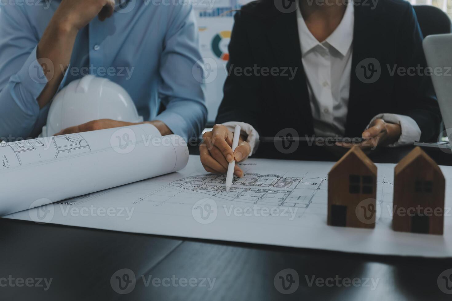 Engineer Teamwork Meeting, Drawing working on blueprint meeting for project working with partner on model building and engineering tools in working site, Construction and structure concept. photo