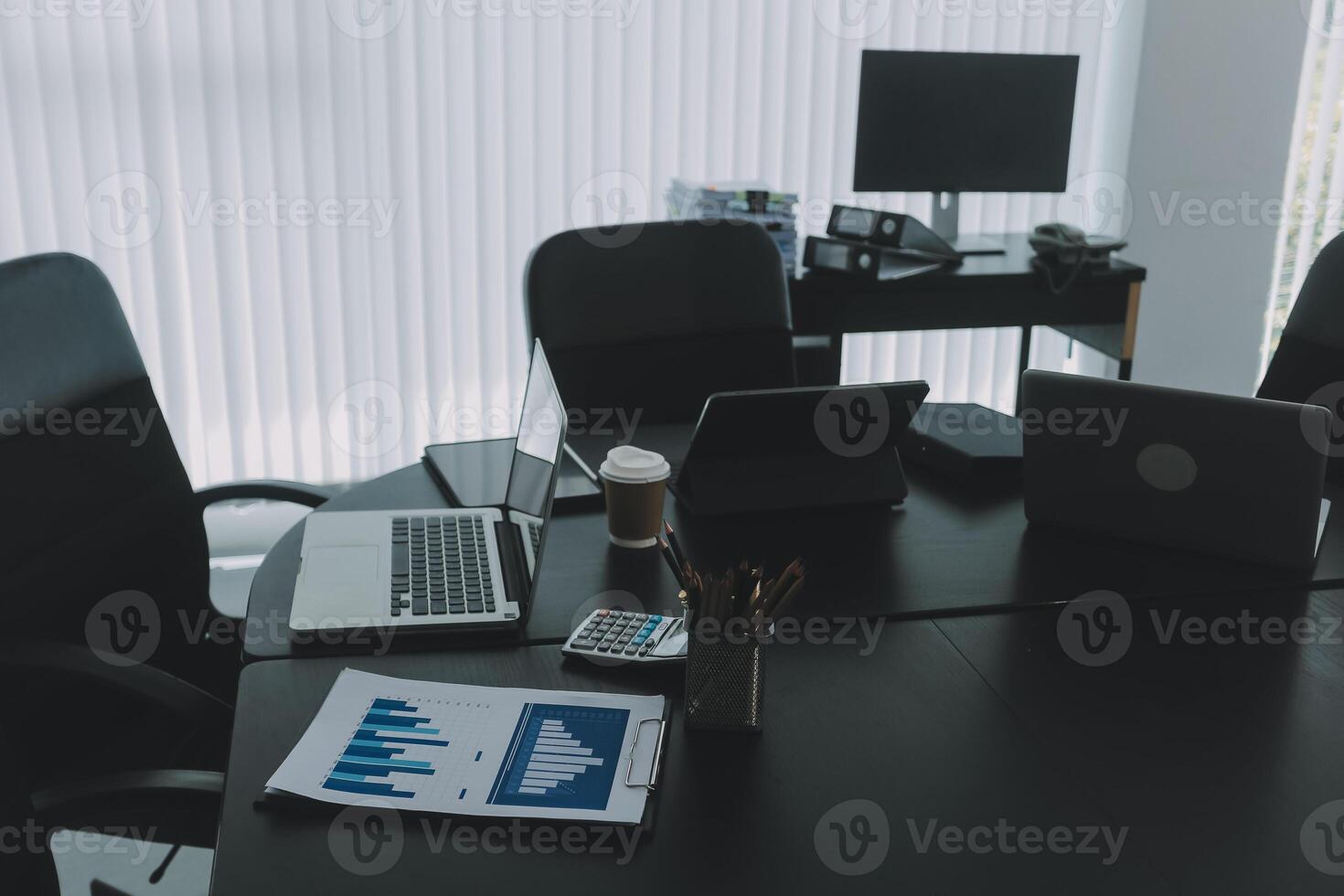 High level meeting of excutive room is decorated with stylish table and chairs around. Conference room is ready for next level of executive meeting. photo