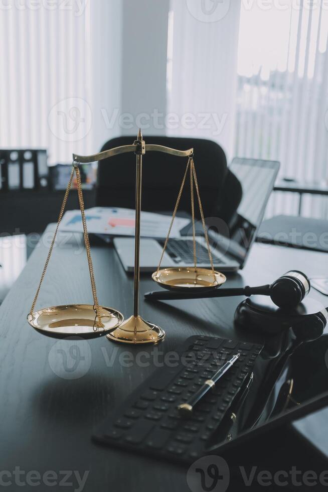 Group of experienced attorneys and lawyers giving consultation to client, helping with difficult lawsuit, explaining legal procedures and discussing agreement terms. Law services and support concept photo