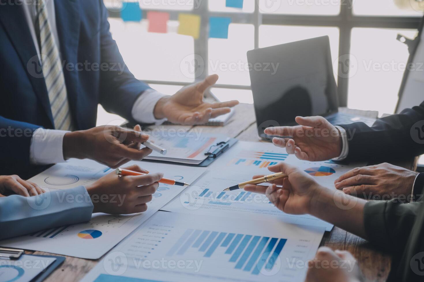 Co working conference, Business team meeting present, investor colleagues discussing new plan financial graph data on office table with laptop and digital tablet, Finance, accounting, investment. photo