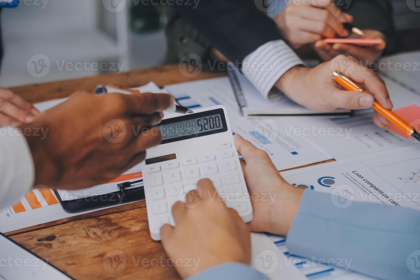 Co working conference, Business team meeting present, investor colleagues discussing new plan financial graph data on office table with laptop and digital tablet, Finance, accounting, investment. photo
