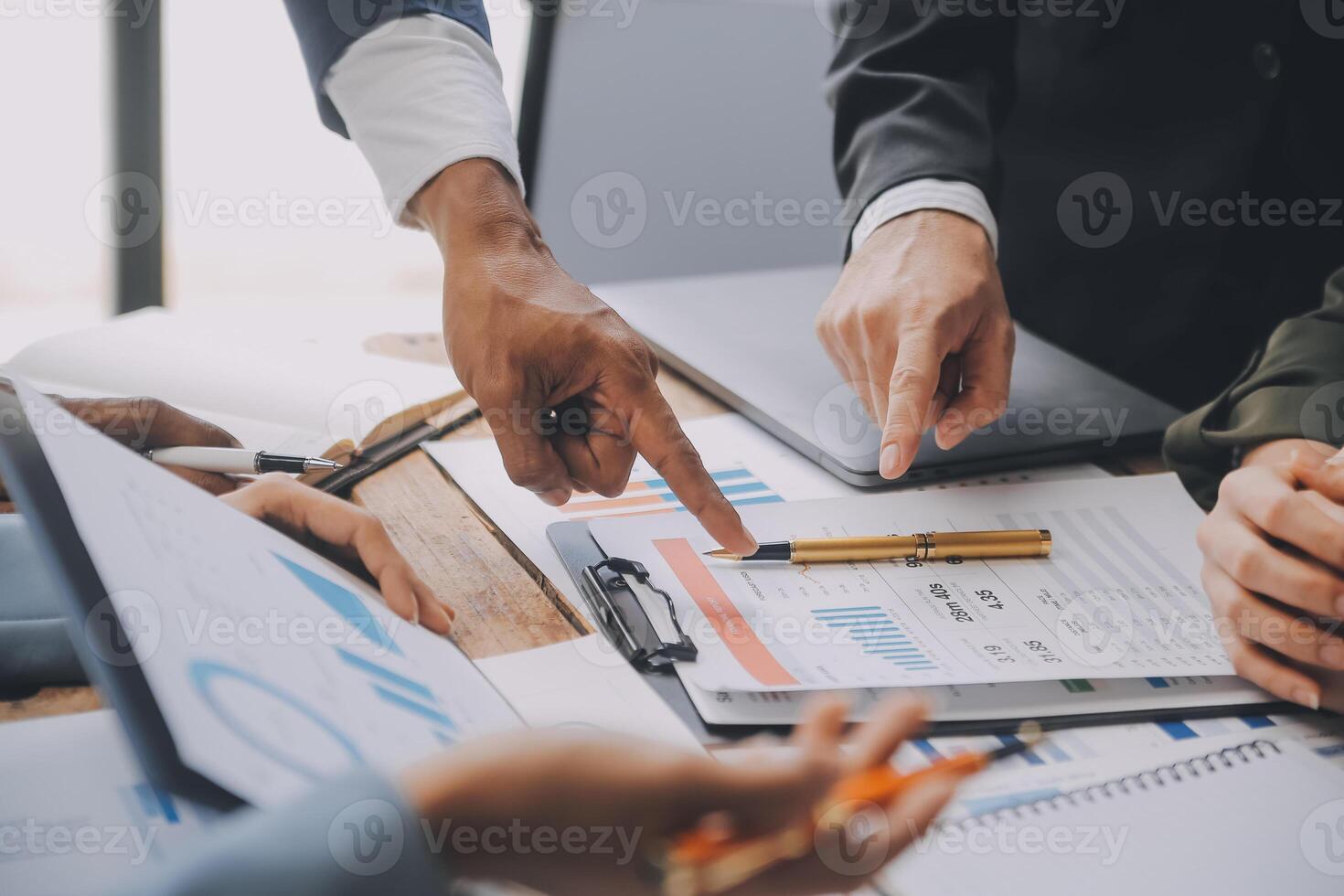 Co working conference, Business team meeting present, investor colleagues discussing new plan financial graph data on office table with laptop and digital tablet, Finance, accounting, investment. photo