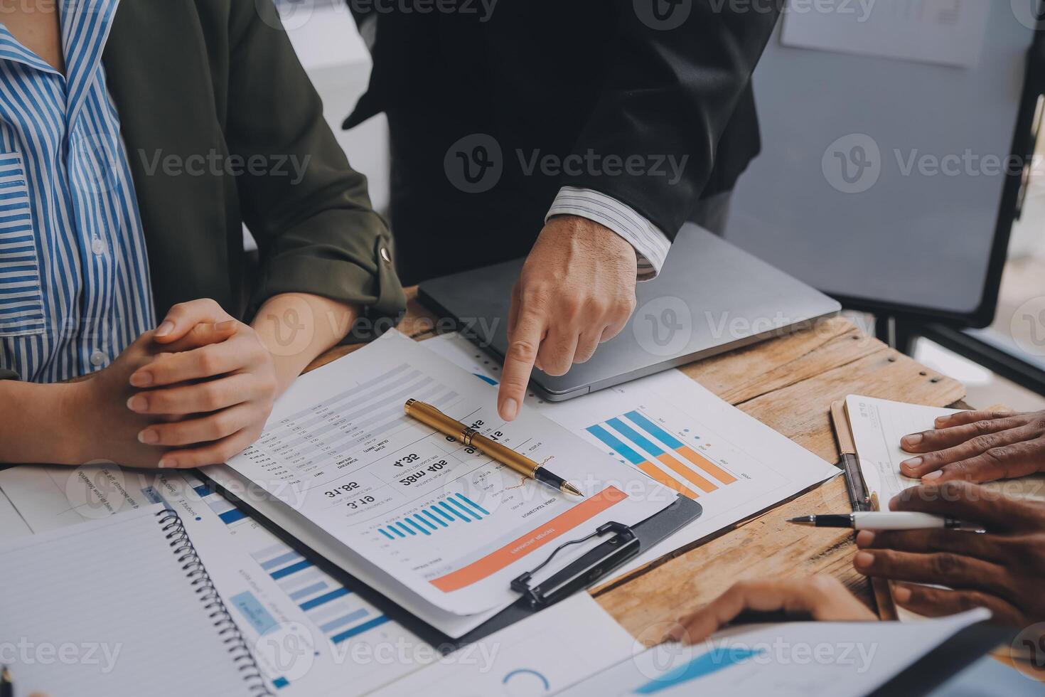 Co working conference, Business team meeting present, investor colleagues discussing new plan financial graph data on office table with laptop and digital tablet, Finance, accounting, investment. photo