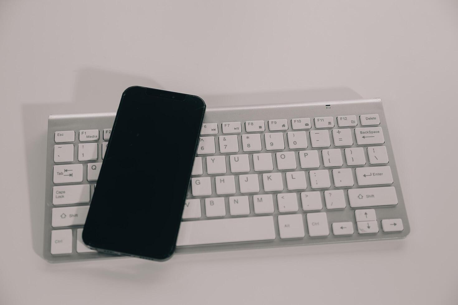 Young woman using apps on a mobile touchscreen smartphone. Concept for using technology, shopping online, mobile apps, texting, addiction, swipe up, swipe down. photo